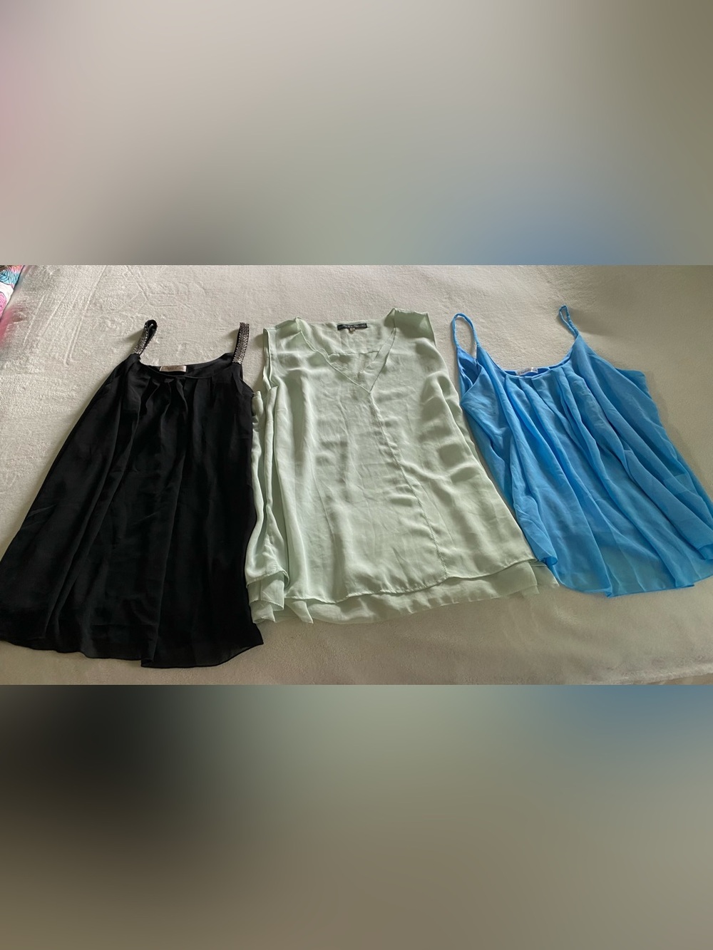 3 sleeveless flowy shirt pale green black and powder blue